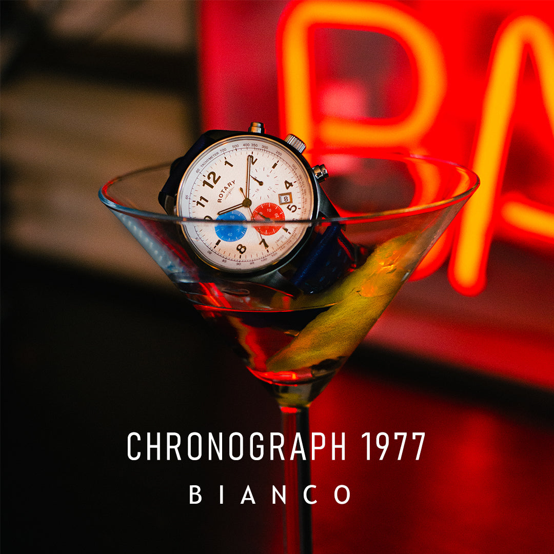 A Rotary Chronograph 1977 Bianco watch in a martini glass at a fancy bar