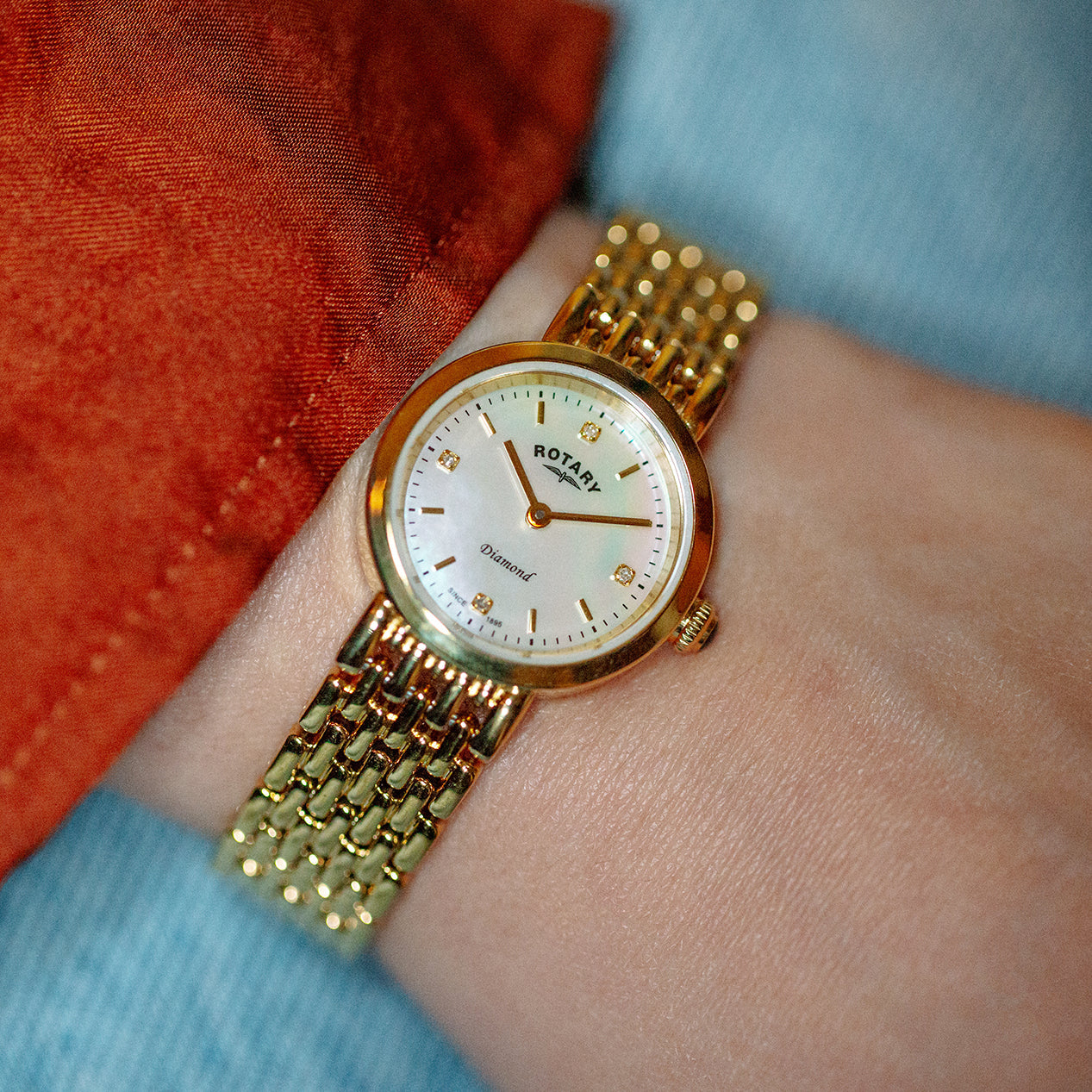 Rotary ladies watch in gold with a mother of pearl dial and diamond indexes