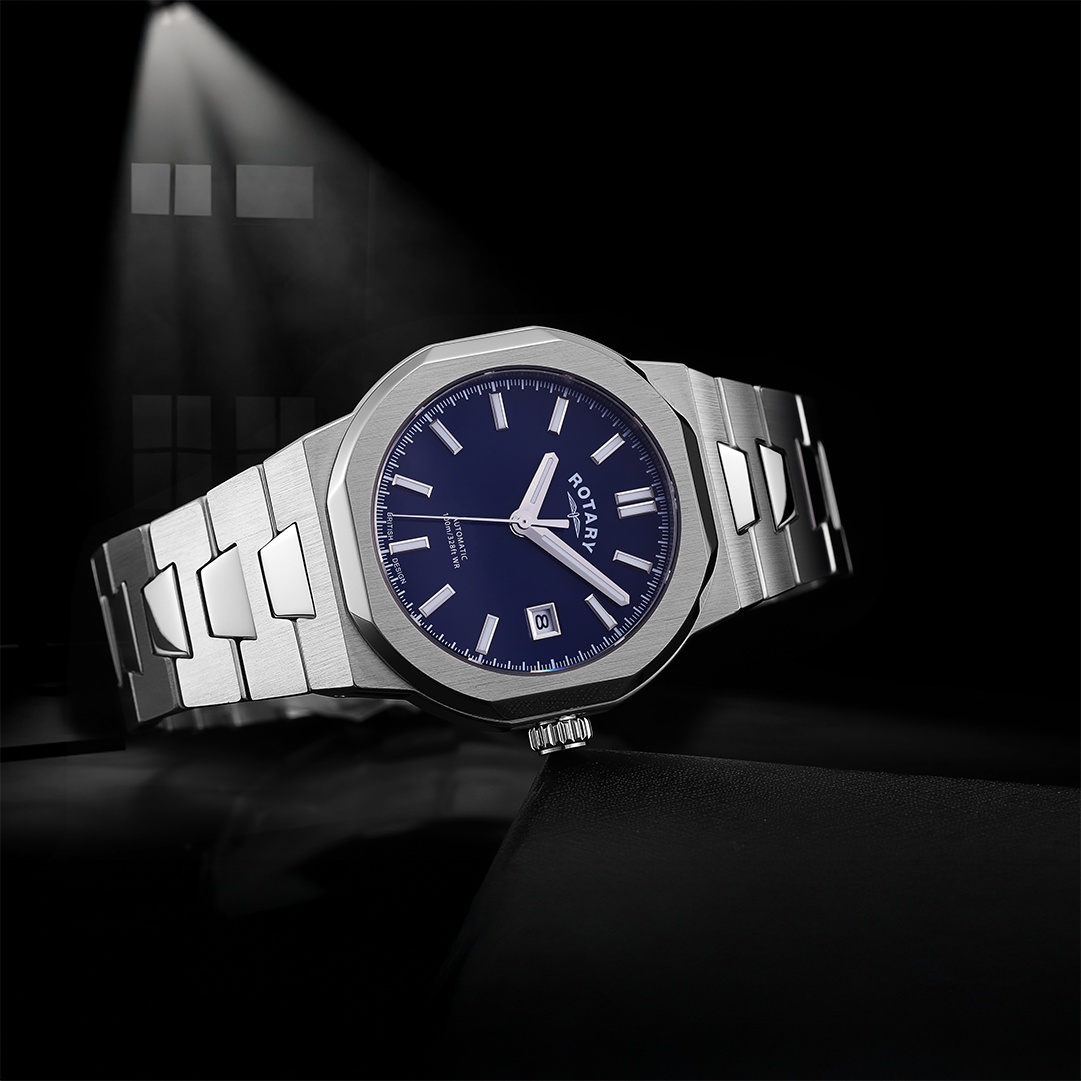 Rotary sport watch in stainless steel with a blue dial on a black background